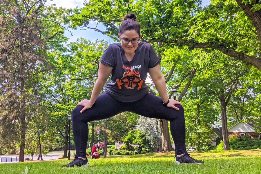 run with amber stretches for runners sumo squat